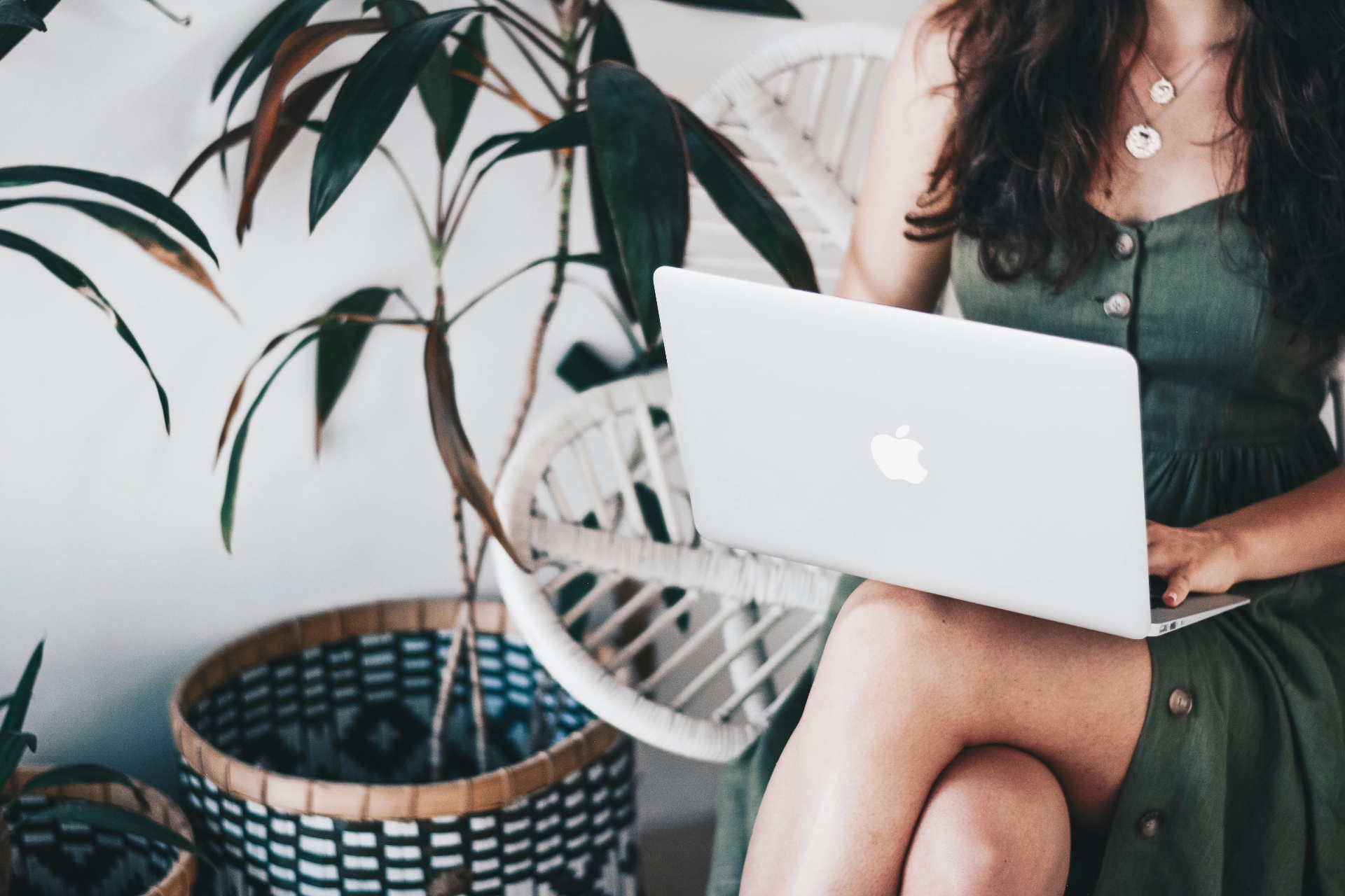 Woman working on laptop representing women in small business building online visibility without social media